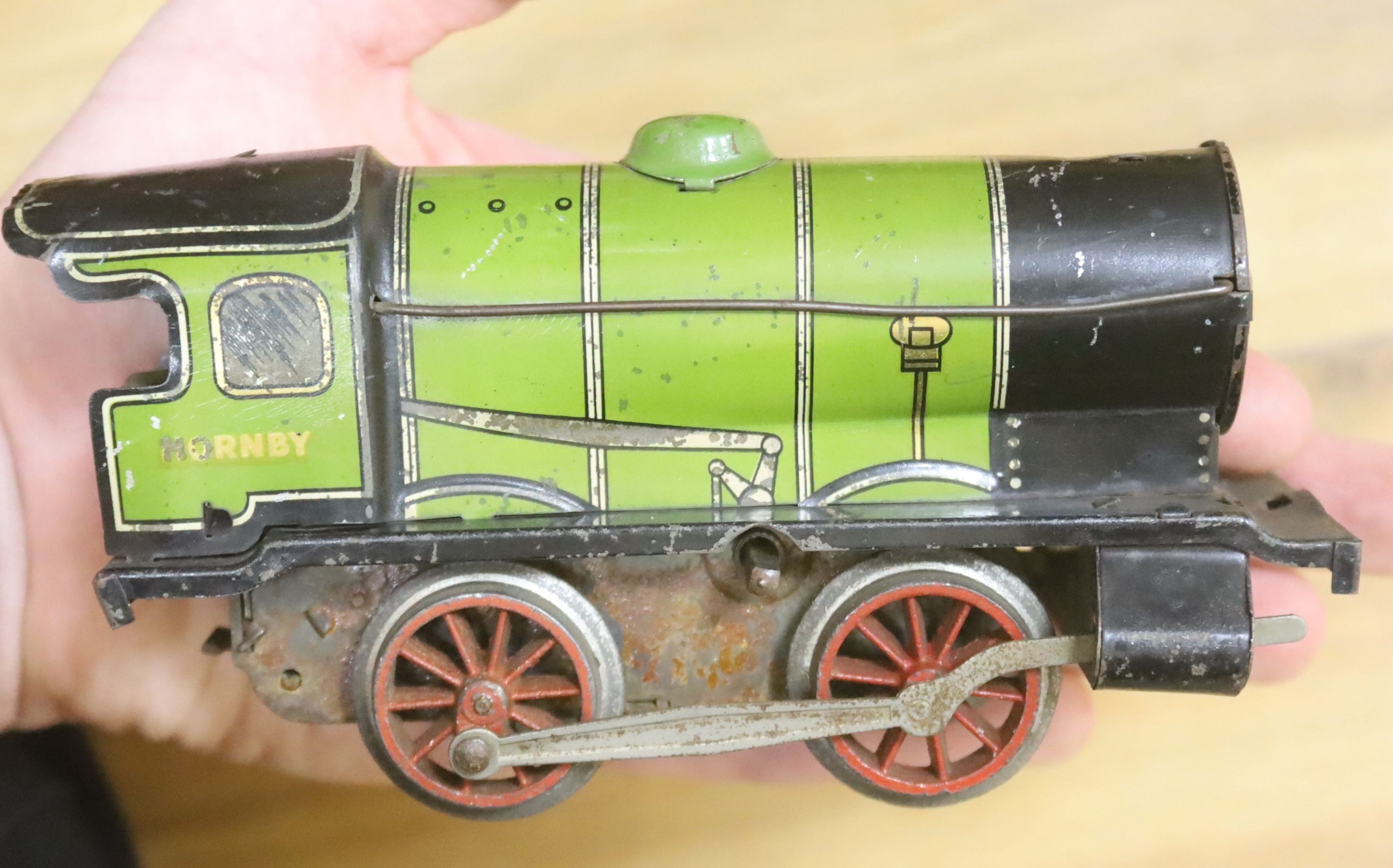 A Hornby O gauge toy train, largely pre-war and a Lehmann tinplate garage, No. 771